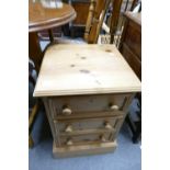 Pine three drawer bedside cabinet