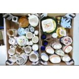 A collection of Wade pottery including tea sets, jugs, egg cups, liqueur, barrels, ash trays,