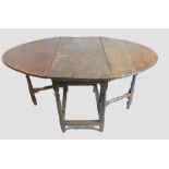 17th century oak gateleg table, split to top, length 90cm.
