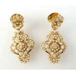 22ct Asian gold pair earrings set with seed pearls, 14.6 grams.