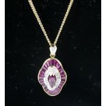 18ct gold ruby and diamond pendant, 8.