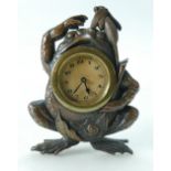 Clock in hard metal novelty frog design case, 15.5cm high.
