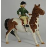 Beswick Girl on a Skewbald pony 1499.