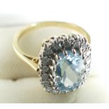 18ct Aquamarine and Diamond cluster ring.