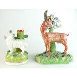 19th century Staffordshire pearlware figure of a stag by a tree,