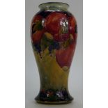 William Moorcroft Burslem vase decorated with Pomegranates on light green/yellow ground, height 22.