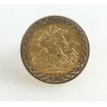 A 22ct Full Sovereign 1892 set in 9ct gold ring, weighing 15.9g gross.