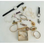 A collection of ladies costume jewellery including wristwatches, brooches,