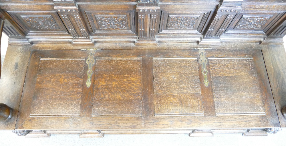 Early 20th century large carved oak double hall seat, length 198cm height 194cm depth 60cm. - Image 3 of 8