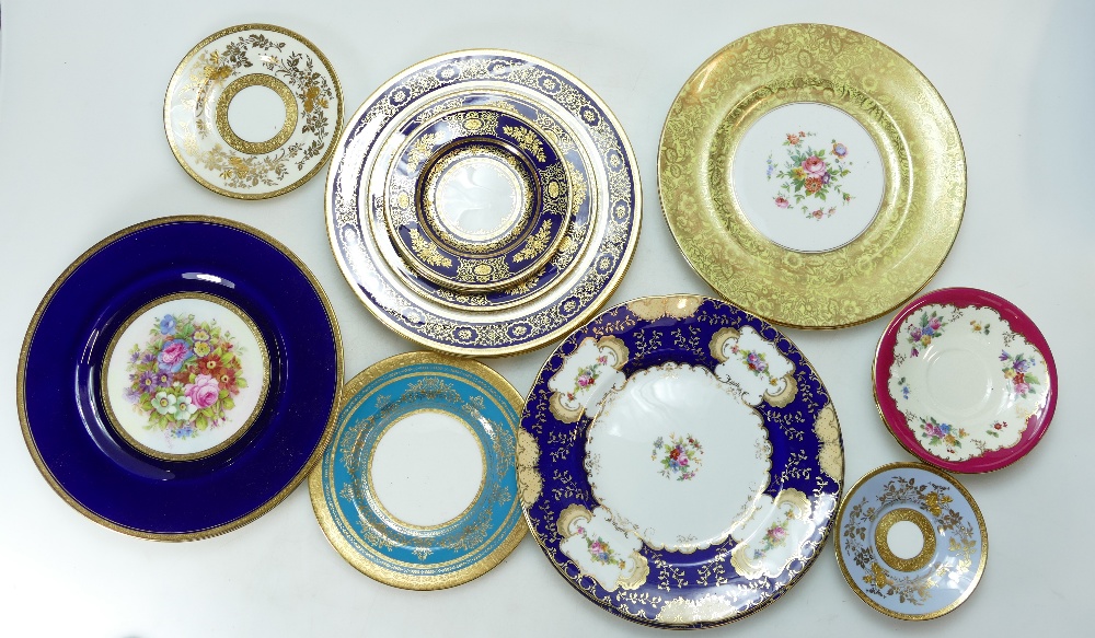 A good collection of Minton gilded and hand painted plates, (2 trays,