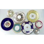 A good collection of Minton gilded and hand painted plates, (2 trays,