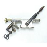 Early 20th century steel & brass bar mounted corkscrew with mahogany handle