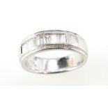 14ct white gold eternity ring set with 9 baguette diamonds, 6.