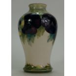 William Moorcroft Burslem vase decorated with Pansy on white ground, height 15cm.