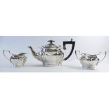 Silver Art Nouveau three piece tea set, hallmarked for Birmingham 1908, 595grams.