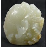 Qing Dynasty (1644-1911) A Chinese white Jade carving of Dragon-Carp, length 6.7cm.