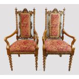Pair of 19th century oak armchairs in the Aesthetic style,