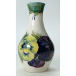 William Moorcroft Burslem vase decorated with Pansy on white ground, height 15cm.