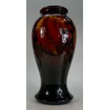 William Moorcroft large Flambe vase decorated in the Leaf & Berry design, height 36cm.