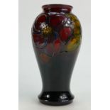 Walter Moorcroft flambe vase decorated in the Clematis design, height 18.