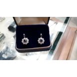 Sapphire and Diamond cluster earrings for pierced ears, set in white gold or platinum. 11mm overall.