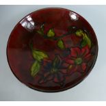 Moorcroft flambe footed dish decorated in the Clematis design,