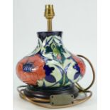 Moorcroft squat Lamp base decorated with a Poppy design by Rachel Bishop, height 18.