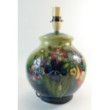 Walter Moorcroft large round lamp base decorated in the Spring Flowers design,