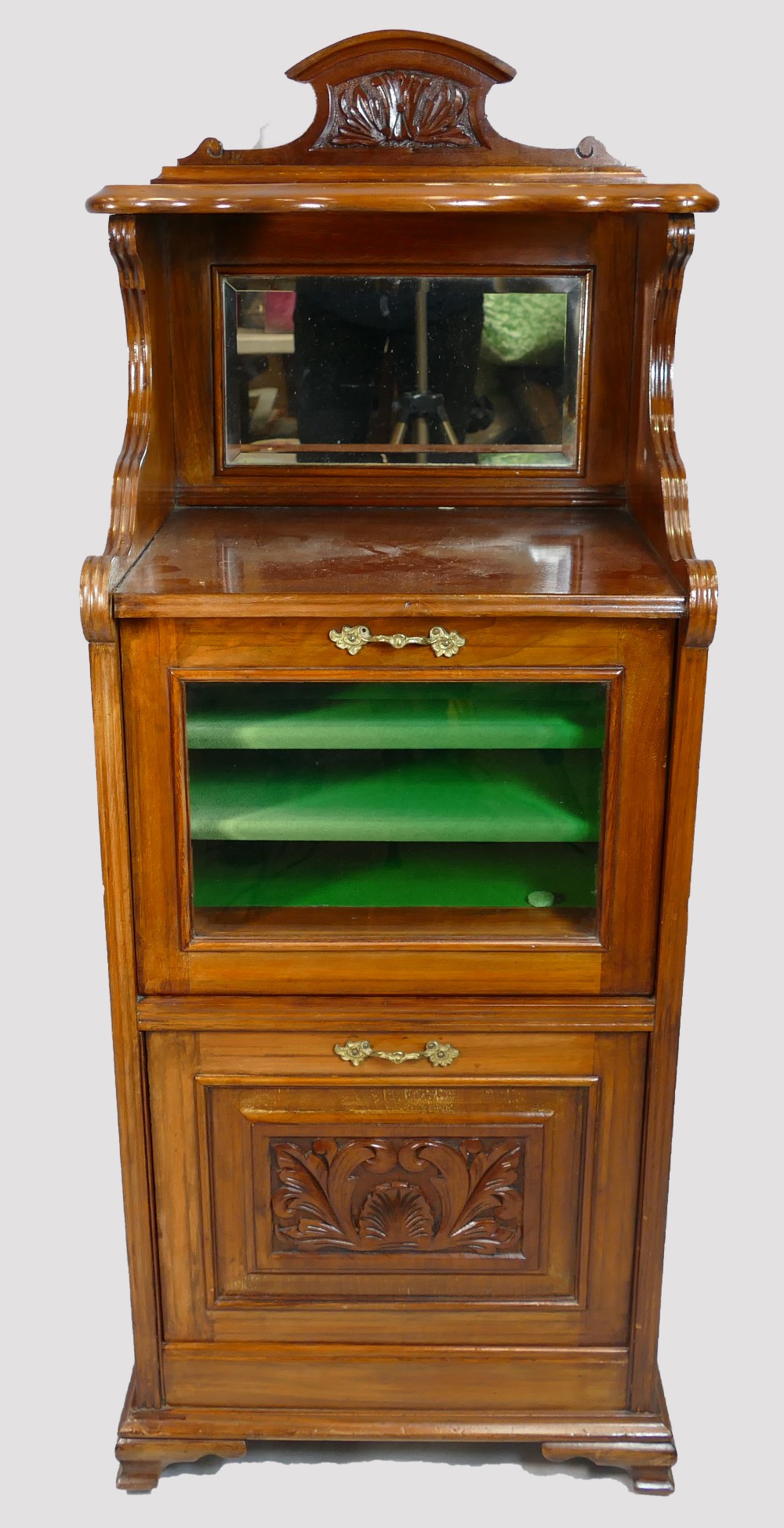 Edwardian walnut carved music cabinet with drop down drawer fronts, originally for sheet music.