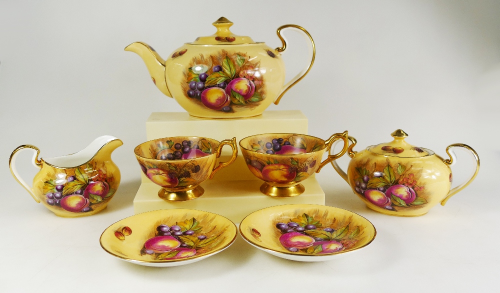 An Aynsley Orchard Gold Tea set including Teapot, sugar bowl, milk jug, cups and saucers etc.