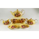 An Aynsley Orchard Gold Tea set including Teapot, sugar bowl, milk jug, cups and saucers etc.