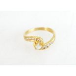 22ct gold ring set with diamonds and a seed pearl, size I, 3.4 grams.