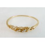 18ct gold bracelet set with fifteen diamonds, 14.9 grams, unmarked but tested to be 18ct.