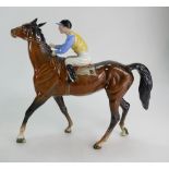 Beswick Jockey on a walking horse 1037, jockey in blue and yellow colours.