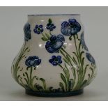 William Moorcroft Macintrye Florian vase decorated with Blue Poppy on white ground, height 10cm.