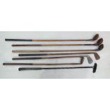 Group of 7 vintage golf clubs, 6 with wooden shafts.