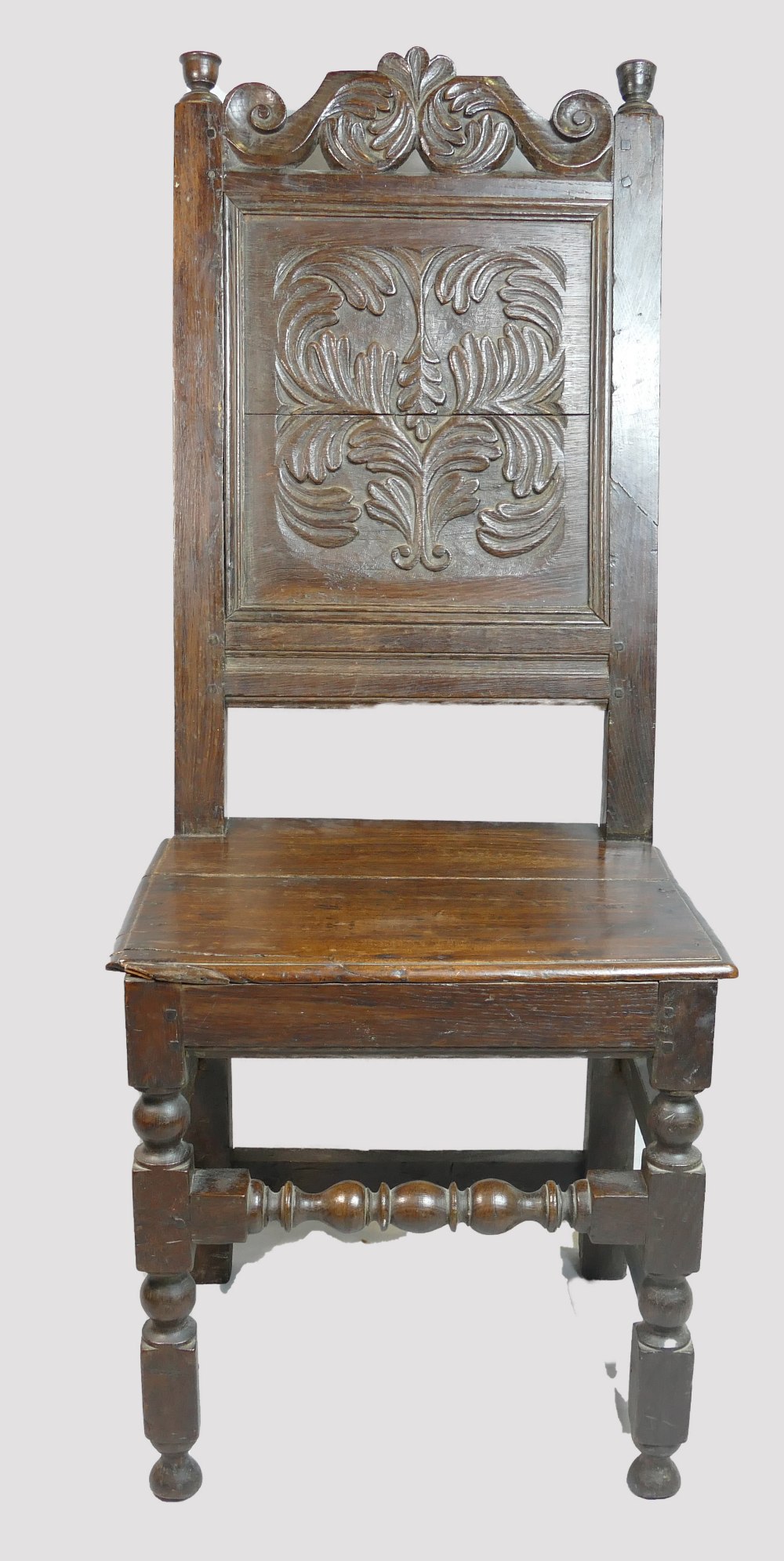 17th century oak hall chair, carved panel, some slight issues.