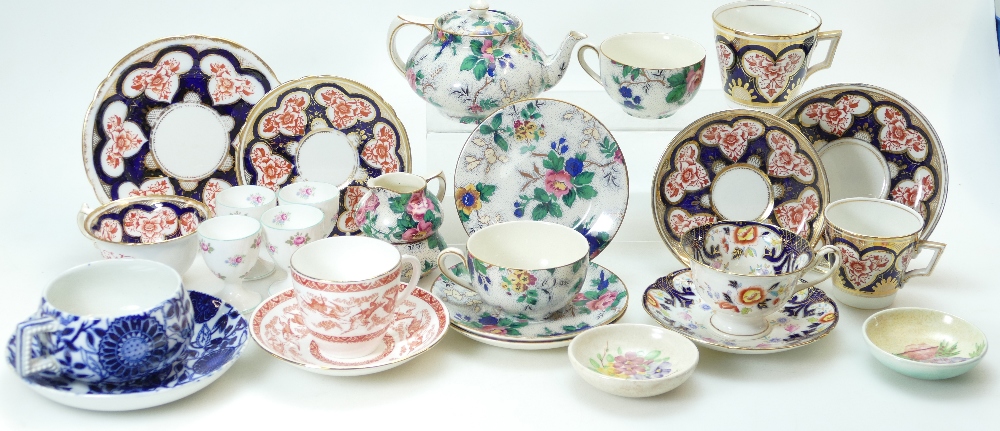 A collection of china trios, cups and saucers by Wileman, Crown Ducal part Tea set,