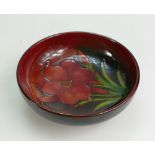 Walter Moorcroft Flambe footed dish decorated in the Freesia design, diameter 11.5cm.