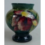 Moorcroft small vase decorated in the Orchid design, height 9cm.