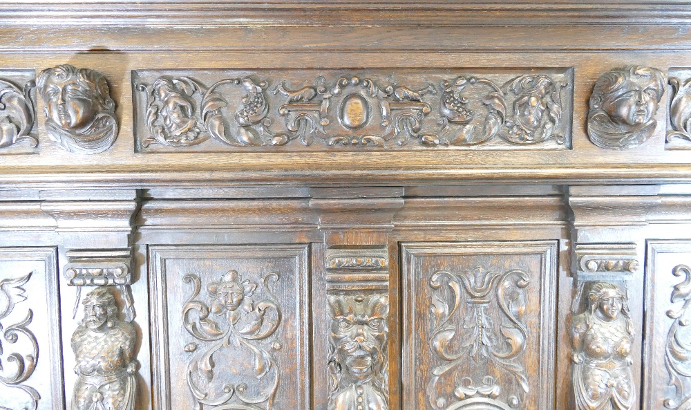 Early 20th century large carved oak double hall seat, length 198cm height 194cm depth 60cm. - Image 7 of 8