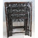 19th century Chinese Rosewood nest of four tables, decorated with carved foliate frieze,