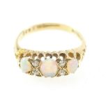18ct gold Ladies three stone opal and diamond ring size N, 3.7 grams.
