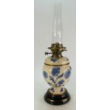 19th century blue & white pottery oil lamp decorated with butterflies and flowers with Hinks duplex