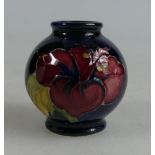 Moorcroft miniature vase decorated in the Hibiscus design, height 5cm.