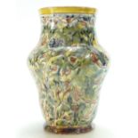 Della Robbia vase 18.5cm high. 2 glaze nibbles to rim plus small re-stuck piece. 2 chips to base.