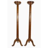 Pair 19th century oak Torchere stands on tripod legs, height 138cm.