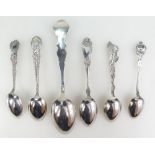 A collection of Sterling silver spoons commemorating North American places including President