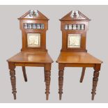 Victorian pair of mahogany hall chairs with tiled backs (2)