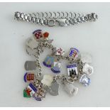 Silver bracelet with large quantity of silver & enamel heraldic charms, and another bracelet.